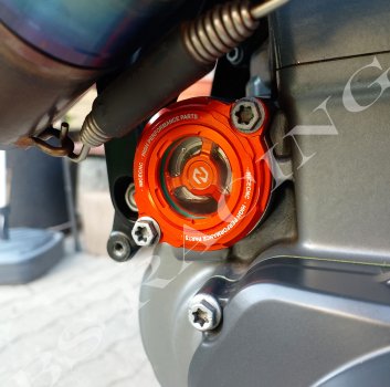 Ölfilterdeckel links mit Schauglas orange passend für KTM 690 SMC R Enduro Duke