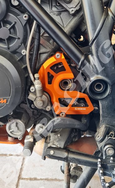 Ritzelabdeckung Orange passend für KTM 1050 1090 1190 1290 Super Duke R GT Adventure